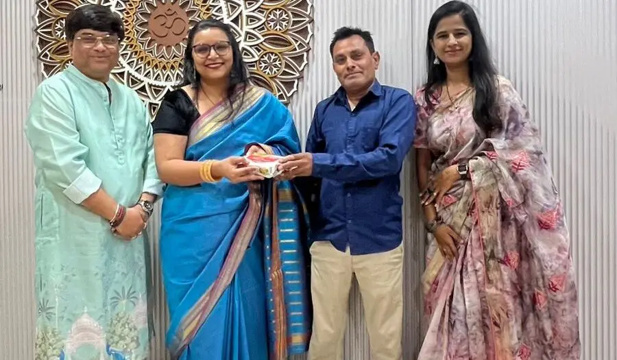 GIAS team showing corporate and cultural harmony in traditional attire.