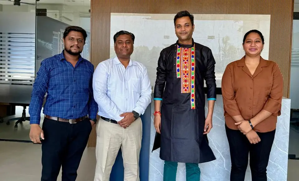 GIAS team members in professional group photo wearing Indian traditional clothes.